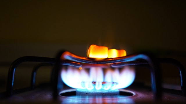 gas burner with blue and orange flame